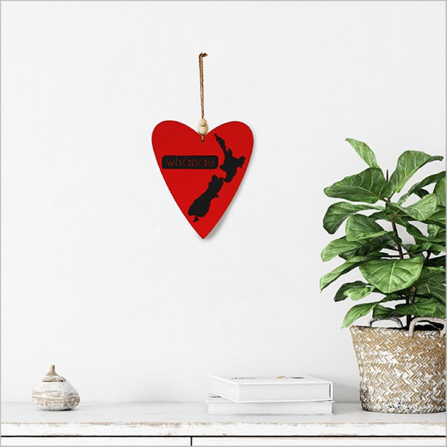 Heart-shaped Kiwiana wall art in black acrylic, symbolizing family and love, perfect for home decor.