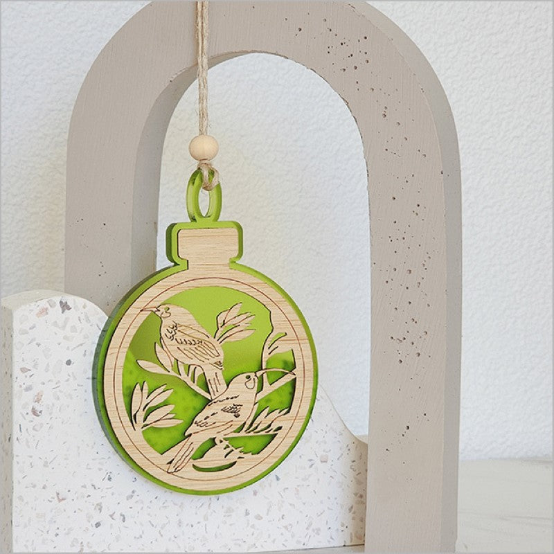 Lime satin acrylic bauble with Huia motif, 80mm x 110mm, perfect for holiday decor and gifting.
