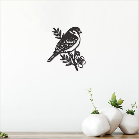 Acrylic wall art featuring a black pihoihoi sparrow, 17.3cm, in sleek matte black for elegant home decor.