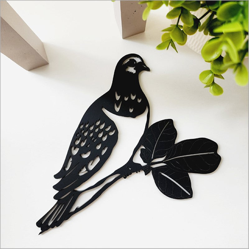 Acrylic wall art featuring a Black Kereru design, measuring 18.9cm, ideal for modern Kiwiana-inspired decor.