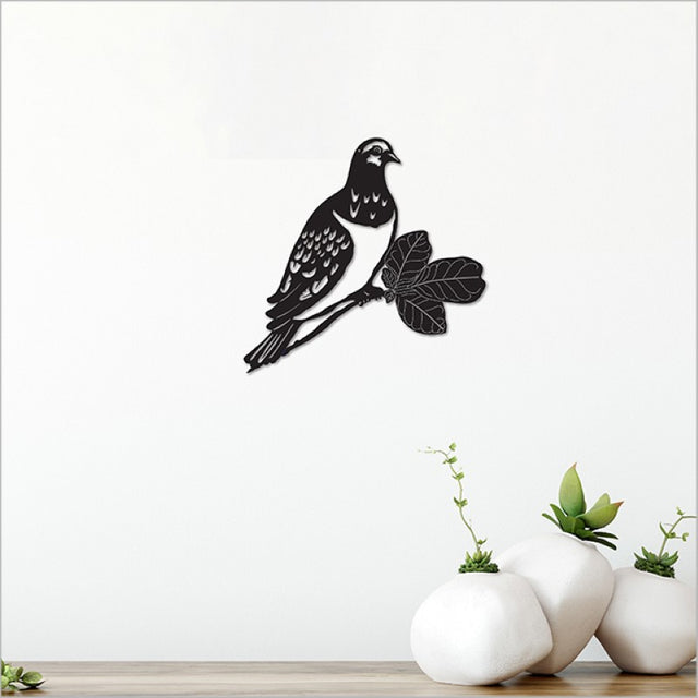 Acrylic wall art featuring a black Kereru, measuring 18.9cm, ideal for modern Kiwiana-inspired decor.