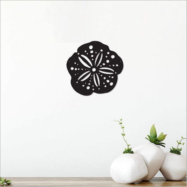 A stunning 16.5cm Black Kina acrylic wall art piece, reflecting New Zealand culture for modern Kiwiana decor.