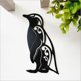 Acrylic wall art featuring a black little blue penguin, measuring 20cm, perfect for modern home decor.