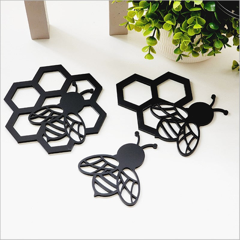 Acrylic wall art set featuring elegant black bees in three sizes, perfect for modern and classic home decor.