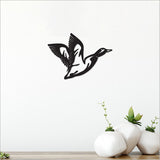 Acrylic wall art of a minimalist black flying duck, perfect for modern home decor and easy to mount.