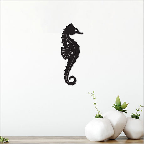 Acrylic wall art featuring a sleek black seahorse, elegantly crafted for sophisticated home decor.