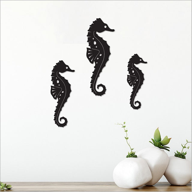 Black acrylic seahorse wall art set in three sizes, adding nautical elegance to modern home decor.