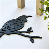 Black acrylic Tui wall art, 104mm x 116mm, sleek design for modern elegance in home decor. Perfect for bird lovers.