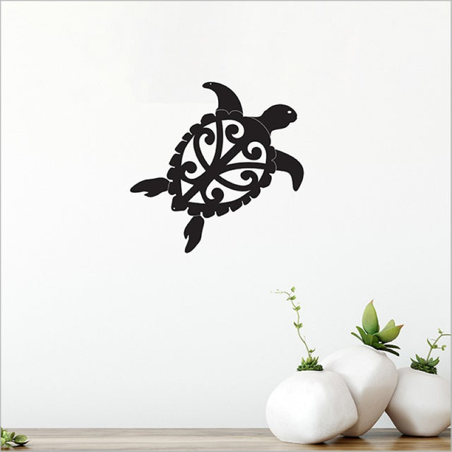 Acrylic wall art featuring a sleek black honu turtle, perfect for enhancing coastal-themed home decor.