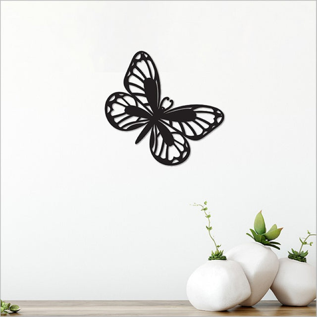 Elegant matt black acrylic wall art featuring a vintage-inspired monarch design, perfect for enhancing any interior decor.