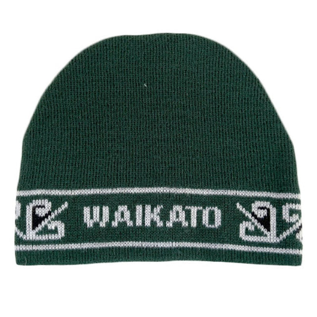 Cozy green and white Maori Waikato beanie, crafted in New Zealand, ideal for warmth and style in cold seasons.