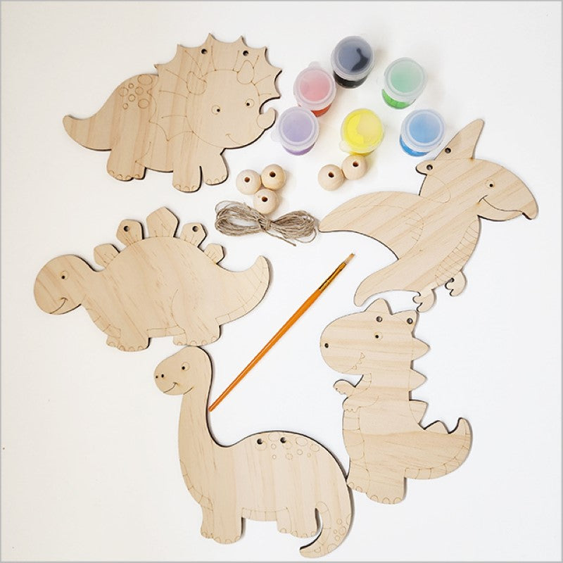 Colorful dinosaur garland DIY kit with paint supplies, perfect for kids' creativity and playroom decor.