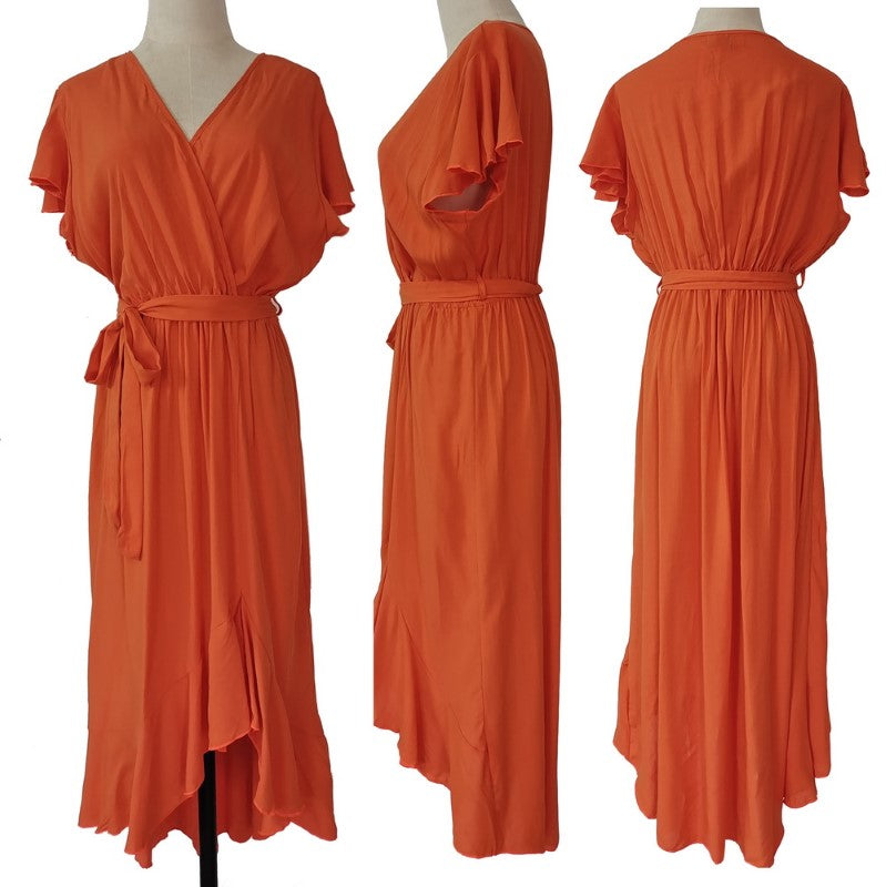 Bias cut hemline dress in vibrant medium orange, crafted from soft viscose for comfort, flattering silhouette, ideal for various occasions.