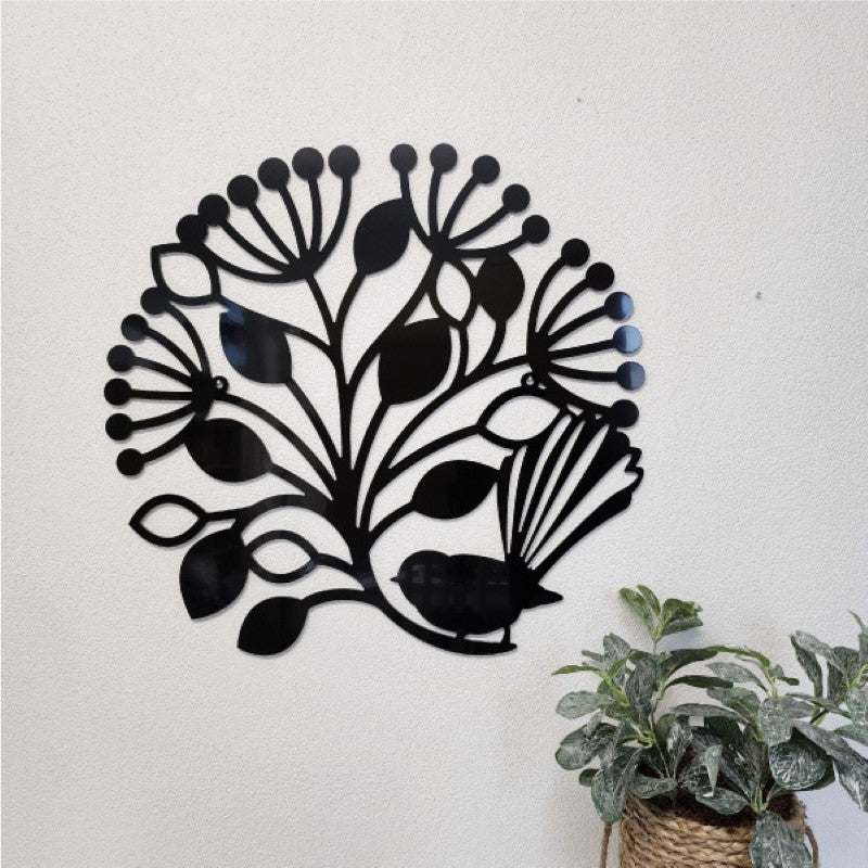 Large black wall art featuring a fantail and pohutukawa design, crafted from durable aluminium composite for indoor/outdoor use.