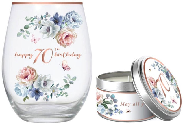 Elegant 70th stemless glass with dancing roses and a vanilla candle, perfect for celebrating special milestones.