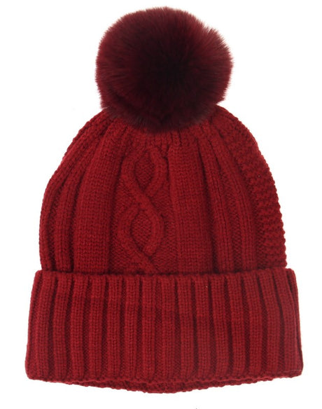 Cable knit beanie set in vibrant red, made from soft acrylic for warmth and comfort in winter activities.