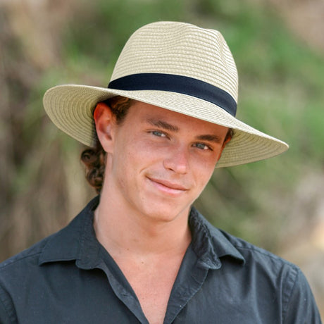 Unisex ivory straw fedora with 8cm brim, UPF 50+, adjustable band for comfort, eco-friendly, stylish sun protection.