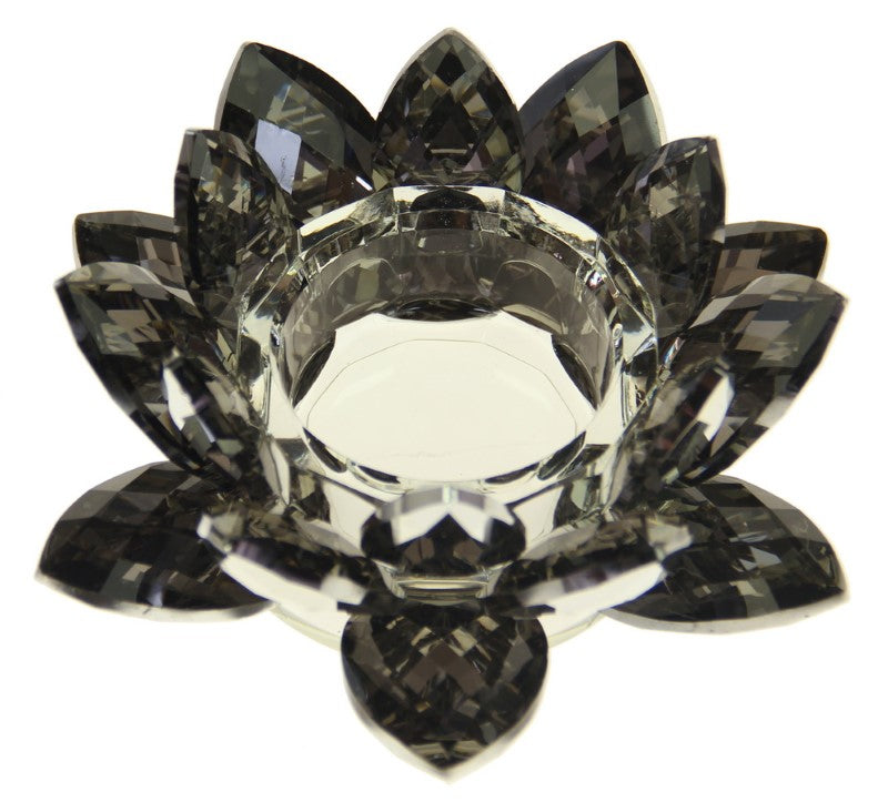 Small grey crystal tealight holder, 15cm wide, elegantly reflects light, perfect for home decor or gifts.