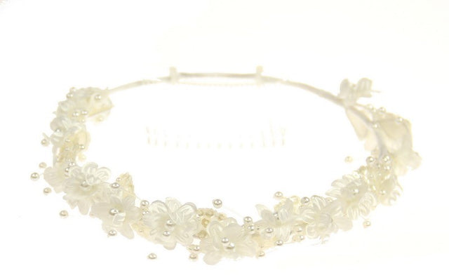 Delicate ivory floral circlet headpiece for brides, enhancing elegance and romance for any wedding theme.