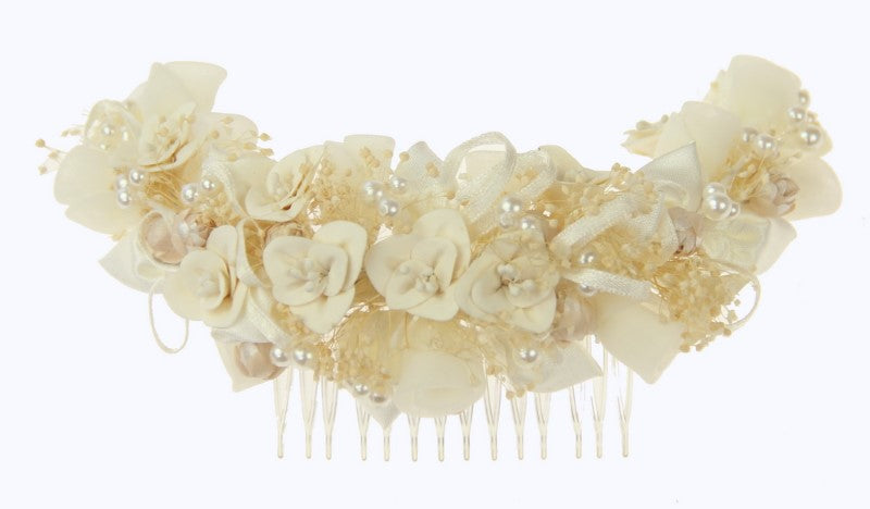 Intricately crafted bridal headpiece featuring shimmering crystals and floral motifs, perfect for enhancing your wedding look.