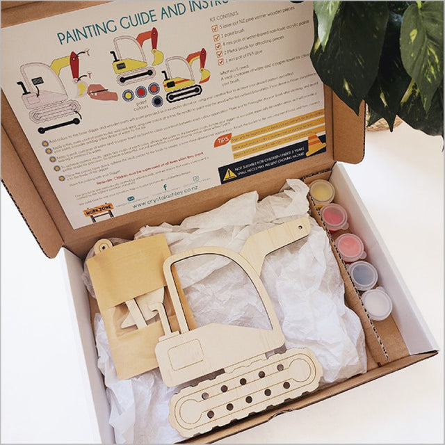 Child-friendly DIY paint kit featuring a movable digger model with non-toxic paints for creative play and fine motor skills development.