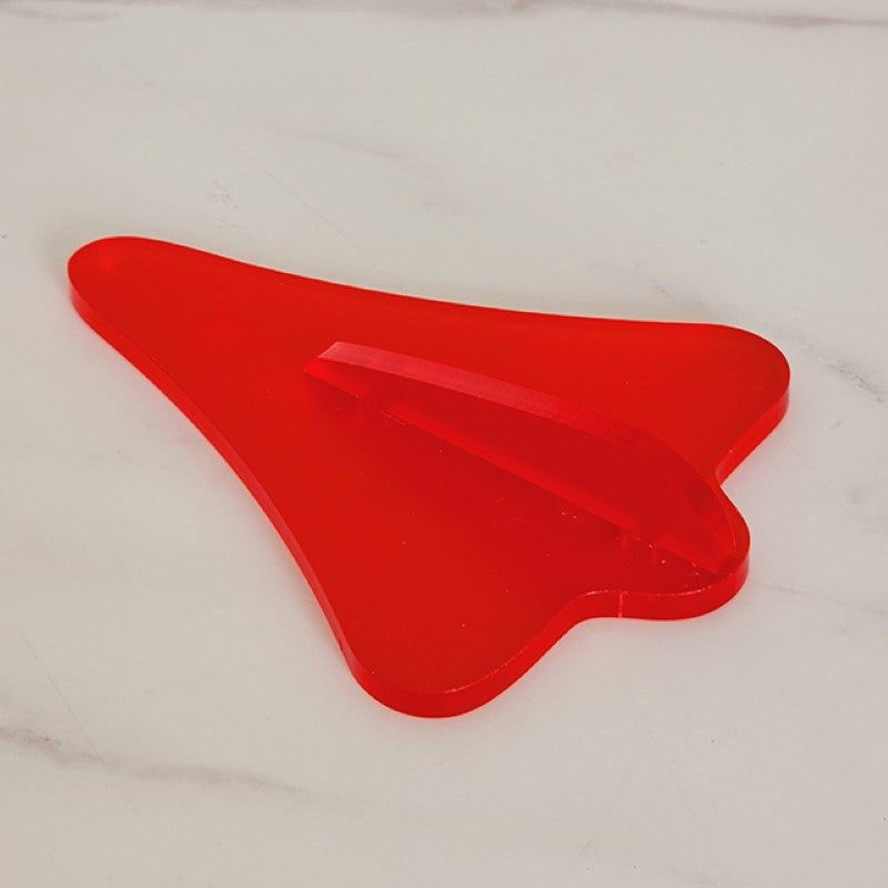 Red satin acrylic jet plane wall art, 105mm x 145mm, perfect for adding a playful touch to any modern space.