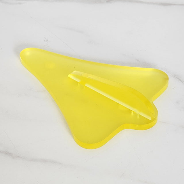 Bright yellow acrylic jet plane wall art, featuring a frosted finish, perfect for children's rooms and playful decor.