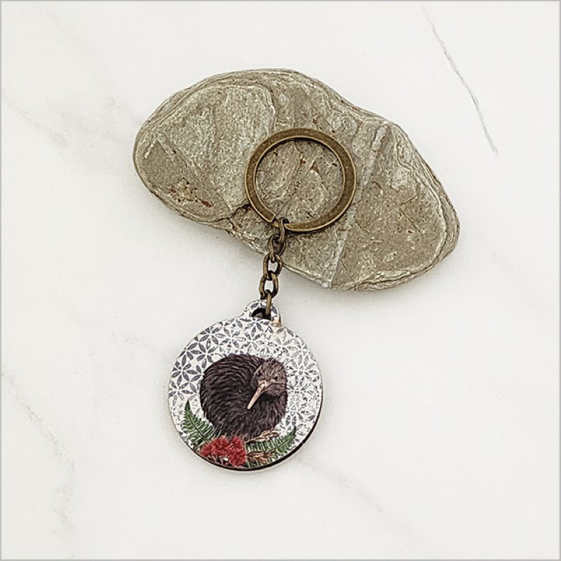 Floral kiwi design keychain made from lightweight pine veneer, perfect for everyday use and as a unique Kiwiana souvenir.