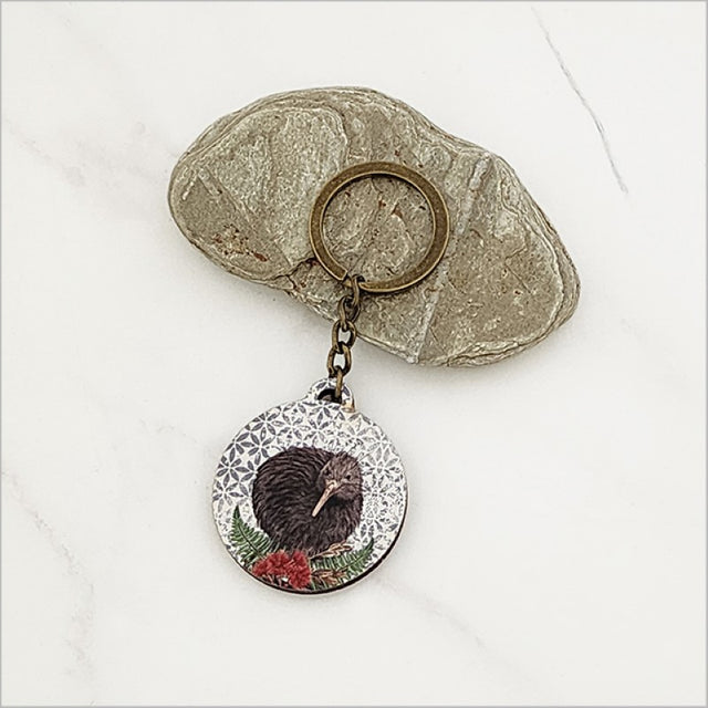 Floral kiwi design keychain made from lightweight pine veneer, perfect for everyday use and as a unique Kiwiana souvenir.