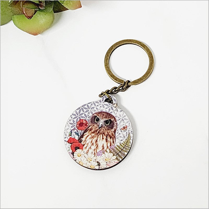 Floral Ruru printed keychain in pine veneer, stylish and lightweight, perfect for everyday use and gifts.