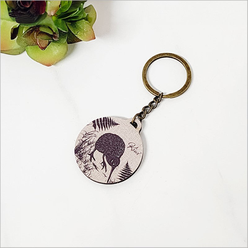 Printed Kiwi+Fern keychain in eco-friendly pine veneer, featuring Kiwiana charm and a stylish design for everyday use.