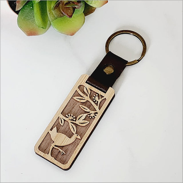 Bamboo keyring featuring a charming Pukeko design, perfect for adding Kiwiana flair to your keys and bags.