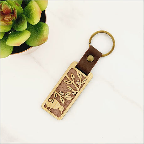 Bamboo keyring featuring a Kiwi design, lightweight and eco-friendly, perfect for keys or bags, with a total length of 110mm.