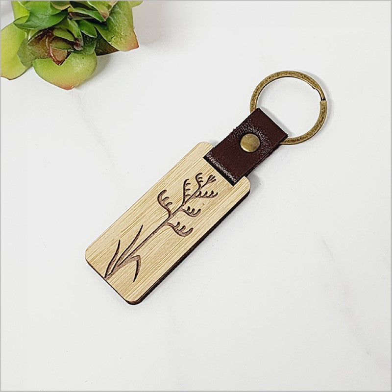 Bamboo keyring featuring eco-friendly design, lightweight and durable, perfect for everyday use and a stylish gift.