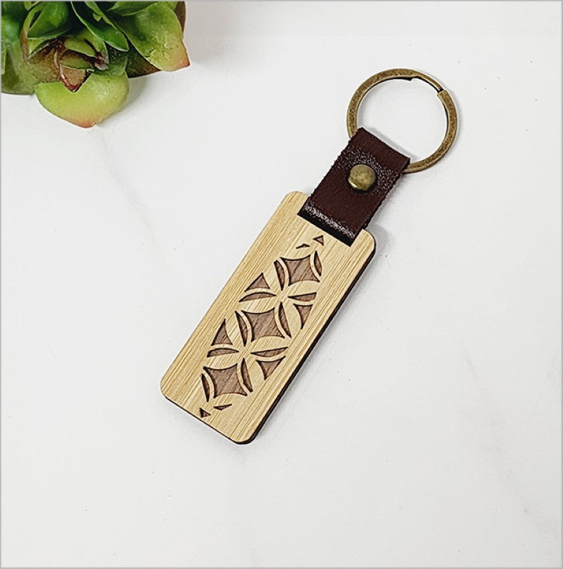Eco-friendly bamboo keyring with Kiwiana charm, lightweight, stylish, and perfect for everyday use or gifting.