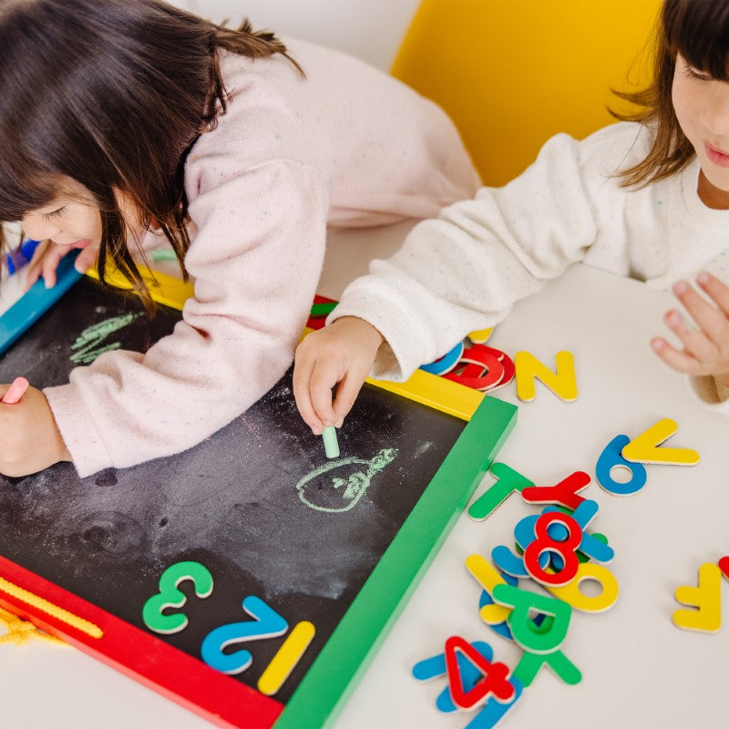 Dual-sided magnetic chalkboard and dry-erase board set by Melissa & Doug; perfect for creative play and learning.