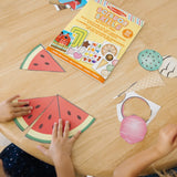 Scissor Skills Activity Pad by Melissa & Doug, featuring 20 paper cutting projects to develop fine motor skills safely.