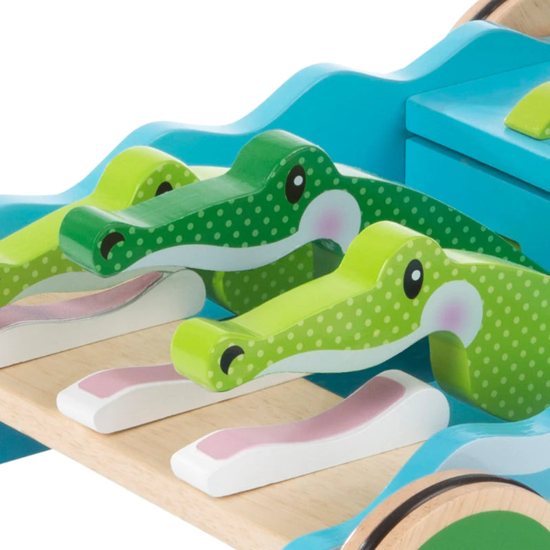 Colorful wooden walker with chomping alligators, designed for toddlers to enhance motor skills and encourage playful exploration.