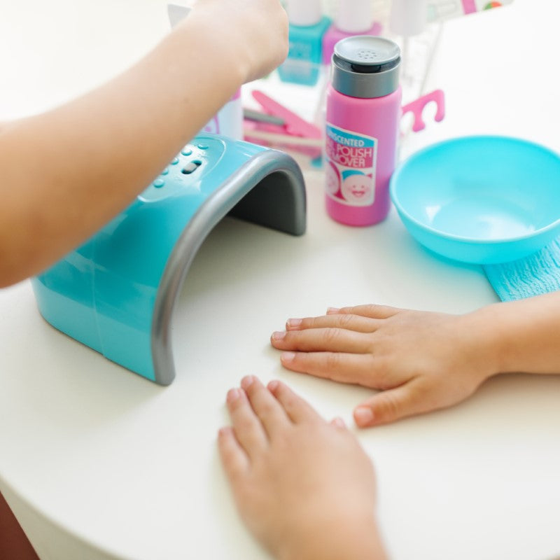 Colorful nail care play set for kids, featuring 20 mess-free tools for imaginative manicures and pedicures without real polish.