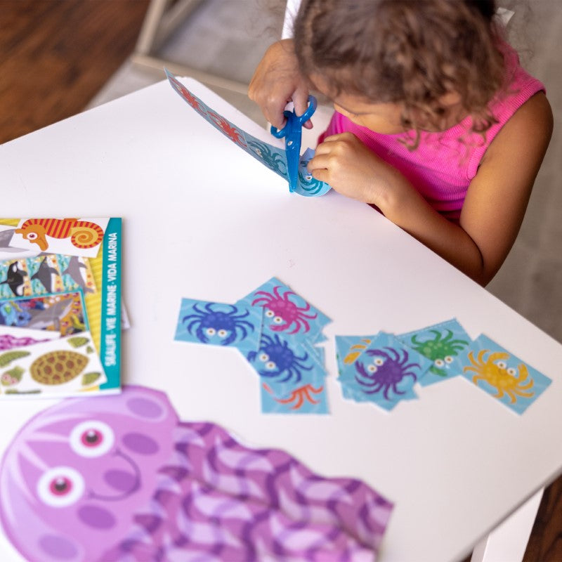 Ocean-themed scissor skills activity pad for kids, featuring 20 projects to enhance creativity and fine motor skills.