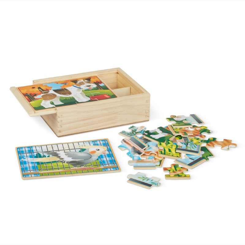 Colorful wooden pet jigsaw puzzles featuring a fish, dog, cat, and bird, stored in a sturdy box with a sliding lid.