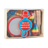 Colorful musical instrument set for preschoolers, including tambourine, cymbals, maracas, clacker, tone blocks, and triangle.