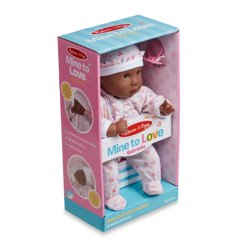 12-inch Gabrielle doll by Melissa & Doug, featuring dark skin, molded hair, cuddly body, and a removable outfit for imaginative play.