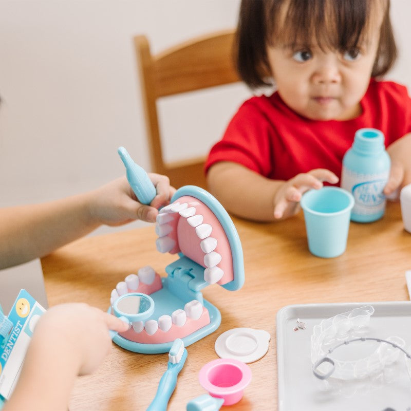 A colorful 25-piece dentist play set for kids, featuring oversized teeth and realistic dental tools to inspire imaginative play.