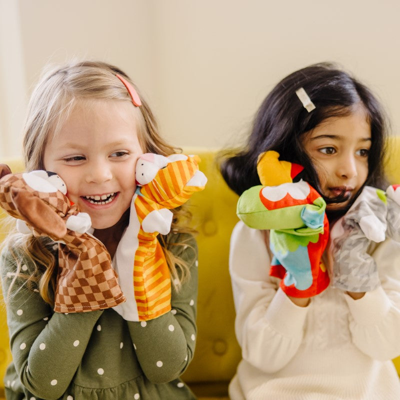 Four colorful hand puppets - a rabbit, parrot, kitten, and puppy - designed for imaginative play and storytelling.