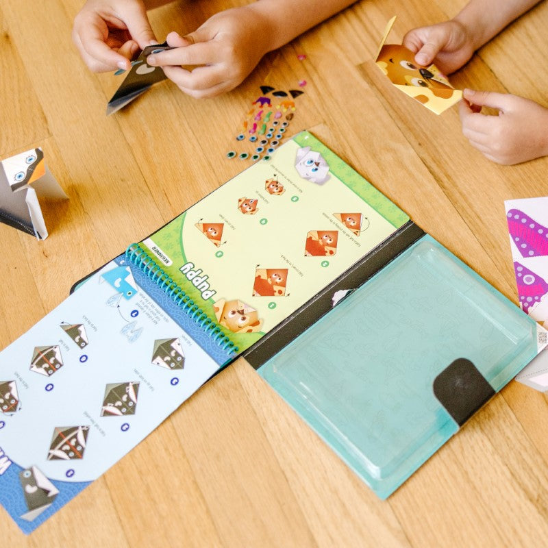 Colorful origami activity set for kids featuring 40 animal designs, vibrant papers, stickers, and easy-to-follow instructions.