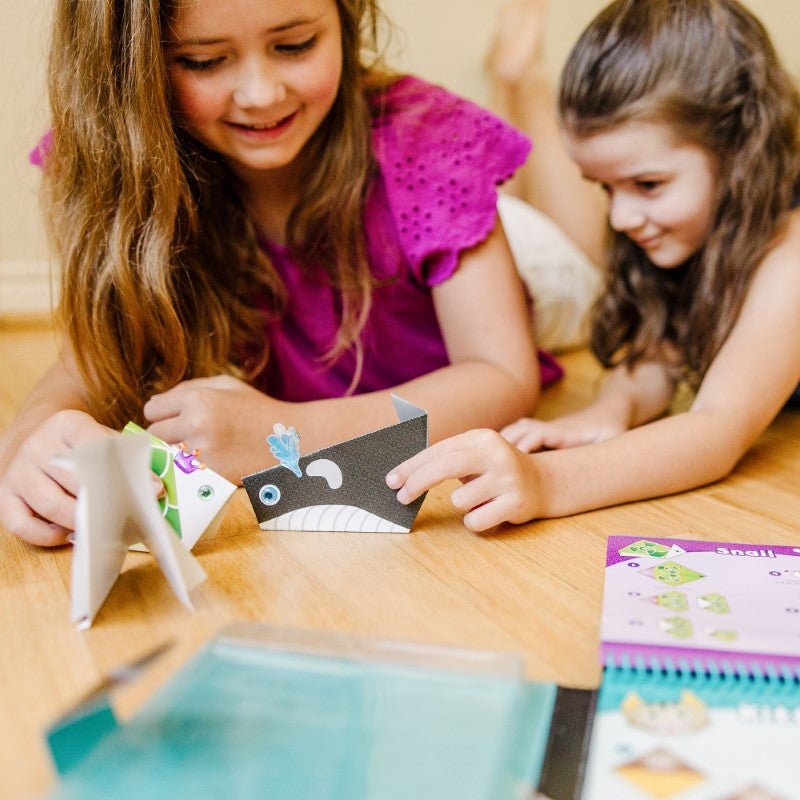 Melissa & Doug's Origami Activity Set for kids includes 36 animal print papers and stickers to create 40 adorable animal crafts.