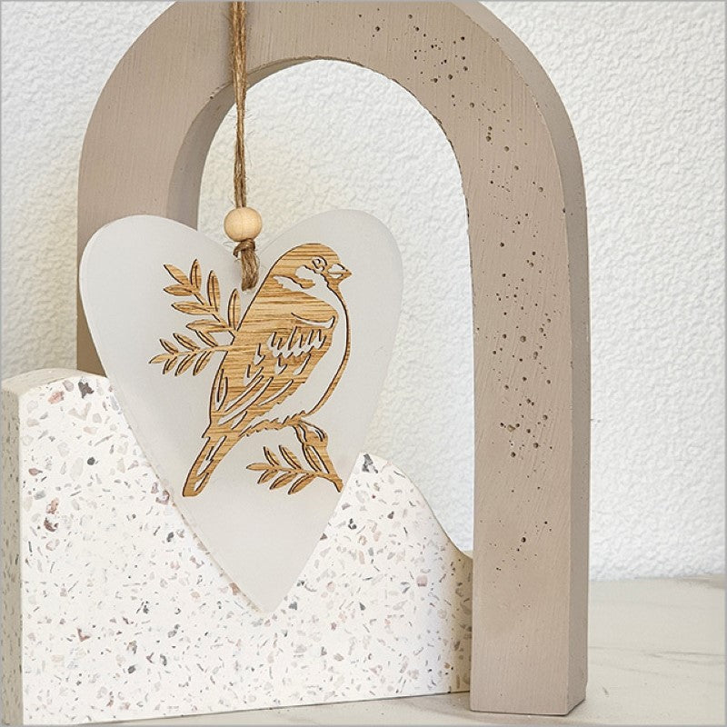 Elegant white heart ornament featuring laser-cut bamboo and satin acrylic, perfect for home decor or as a gift.
