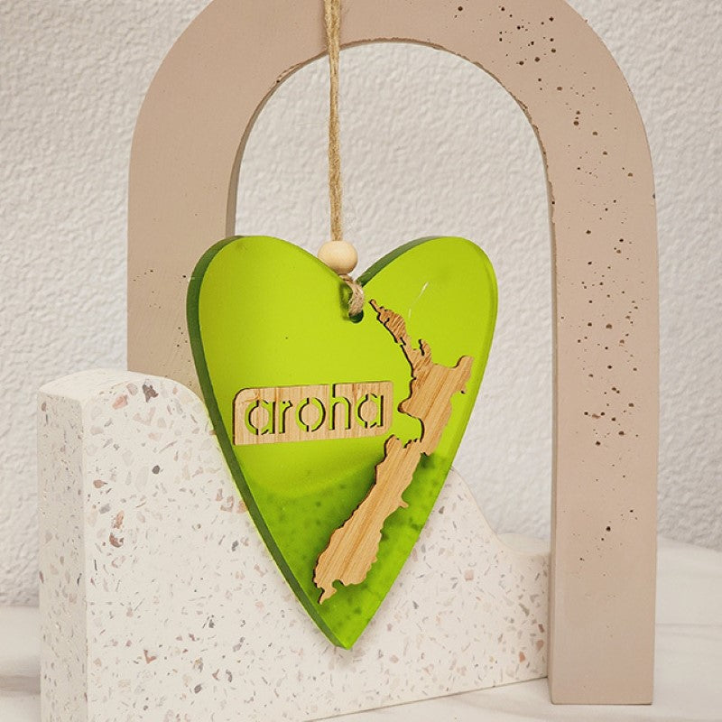 Vibrant lime satin acrylic heart ornament, laser-cut, perfect for home decor or heartfelt gifts, measuring 90mm x 105mm.