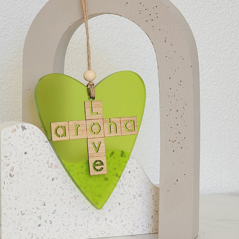 Lime satin acrylic heart ornament showcasing love and Aroha, perfect for home decor or thoughtful gifts.